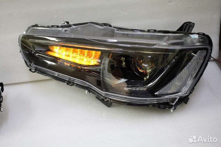 Audi style оптика для Lancer X