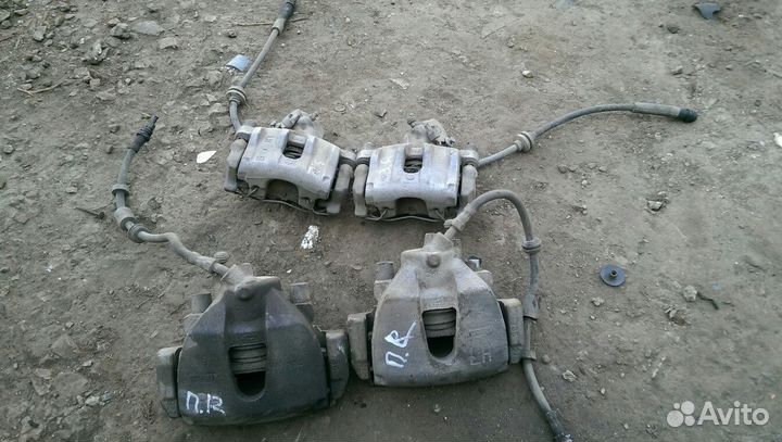 Суппорт тормозной передний Форд Фокус 2