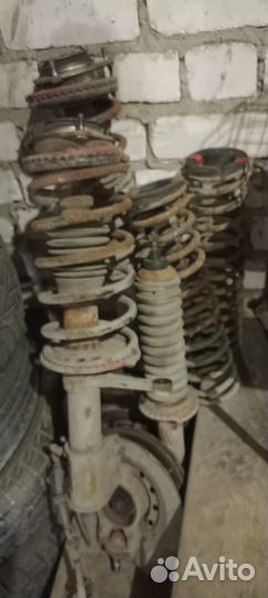 Пружина в сборе с амортизатором ваз 2112