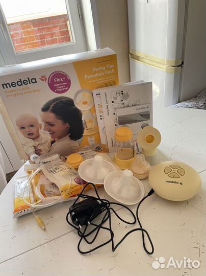 Молокоотсос medela swing электрический