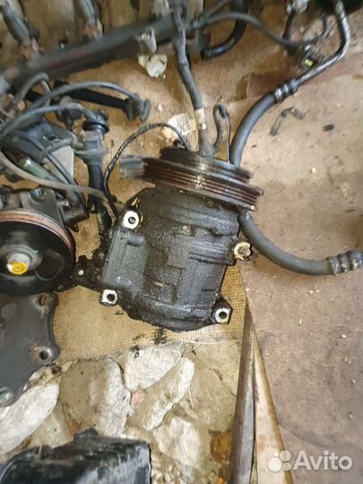 Компрессор кондея на кия Shuma 2