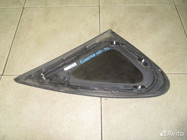 Стекло кузовное глухое левое Hyundai Elantra 4