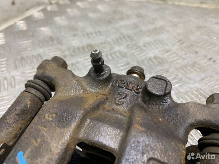 Суппорт тормозной задний левый Renault Koleos HY0