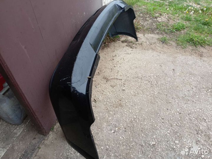 Задний бампер на nissan almera classic