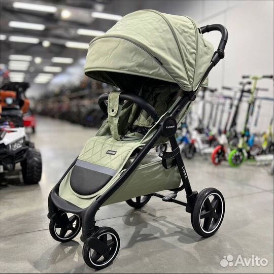 Детская прогулочная коляска Luxmom