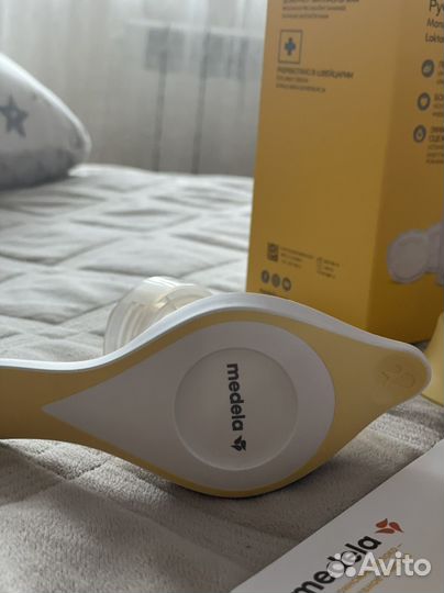 Молокоотсос medela ручной