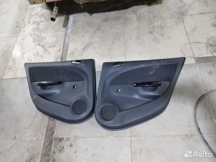 Обшивка двери правая левая Opel Corsa D