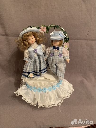 Кукла фарфоровая музыкальная