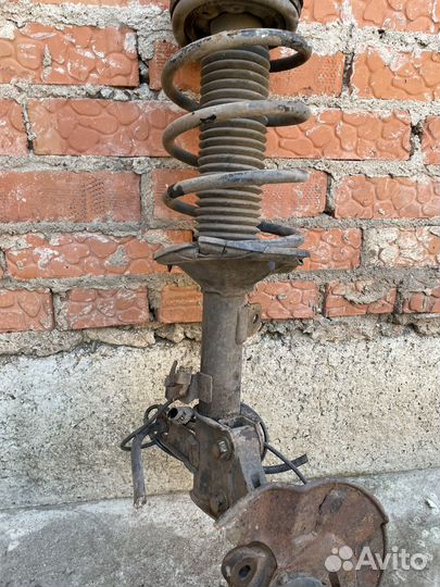 Амортизатор в сборе geely emgrand ec7