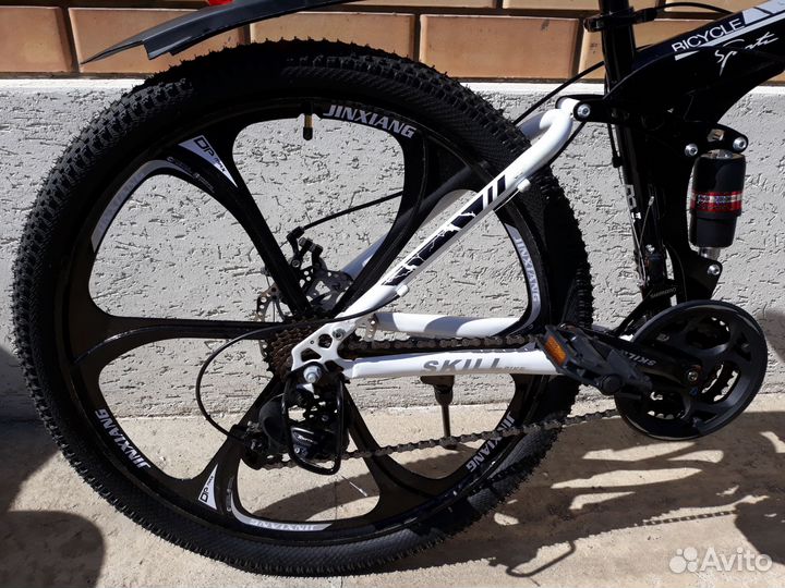 Новый складной велосипед на литых дисках