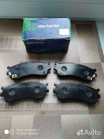 Тормозные колодки новые Киа Спектра