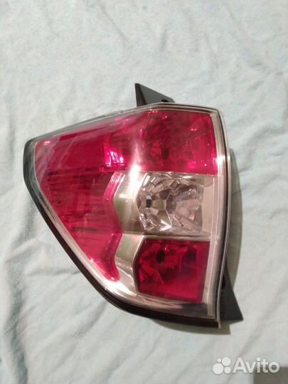 Фонарь задний (левый) на Субару Форестер