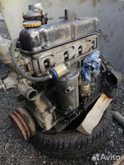 Двигатель газ 24