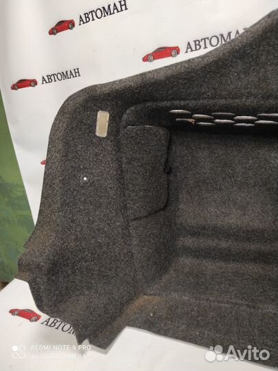 Обшивка багажника левая Шкода Октавия А5