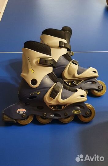 Роликовые коньки