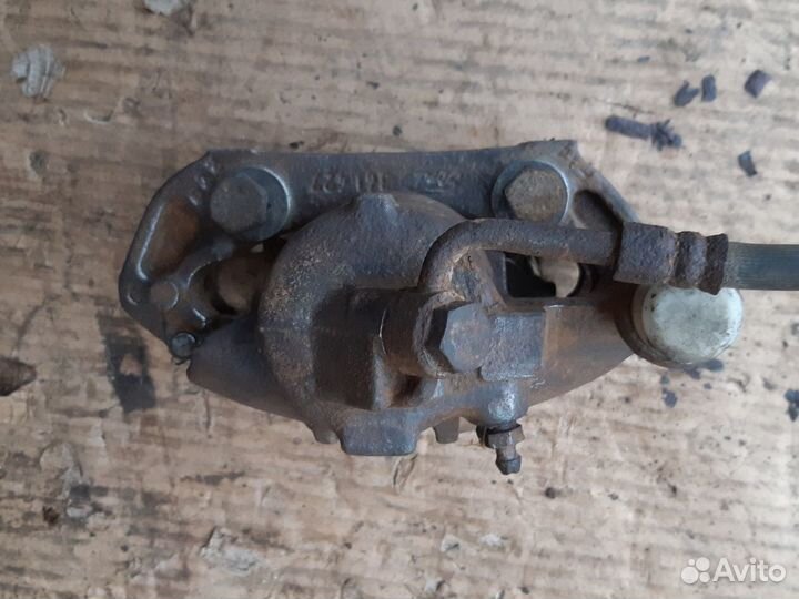 Суппорт передний левый Форд Эскорт 90-95г.в