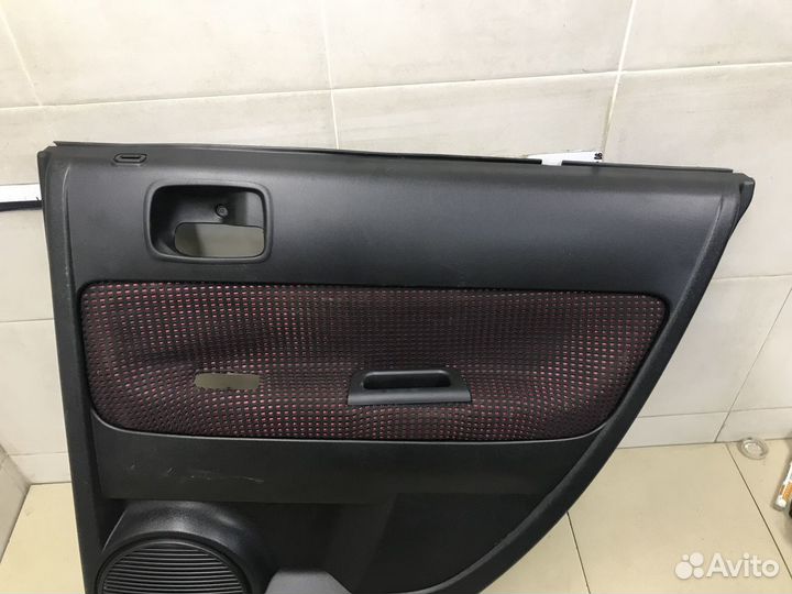 Обшивка двери задней правой M2 (2010-1014)