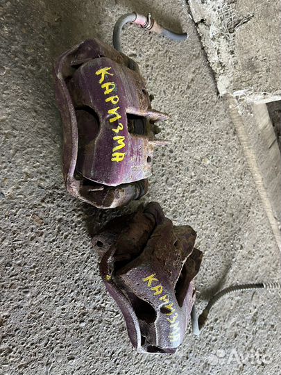 Передние суппорта Mitsubishi Carisma