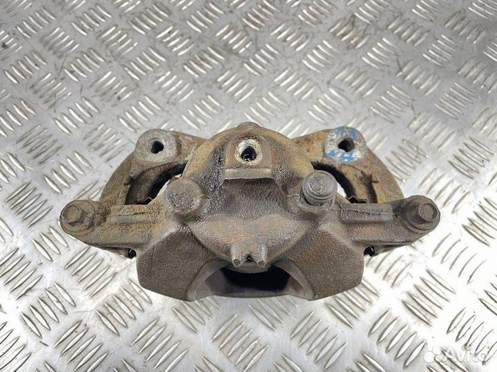 Суппорт тормозной передний левый Opel Astra J