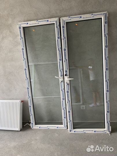 Двери балконные новые