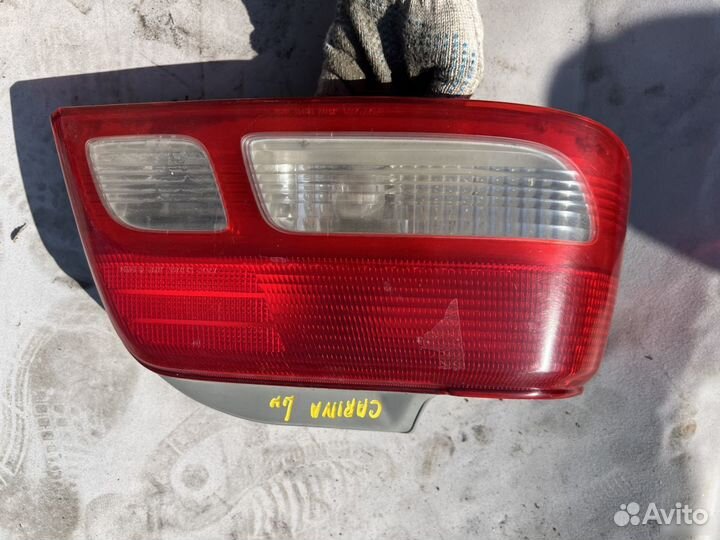 Задний фонарь Toyota Carina ST215 левый