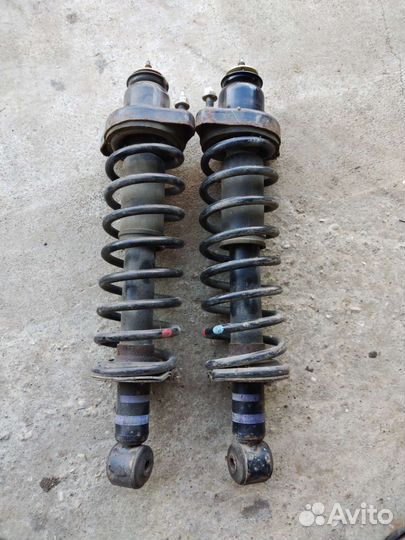 Стойки задние lancer 9