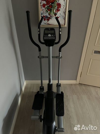 Эллиптический тренажер torneo