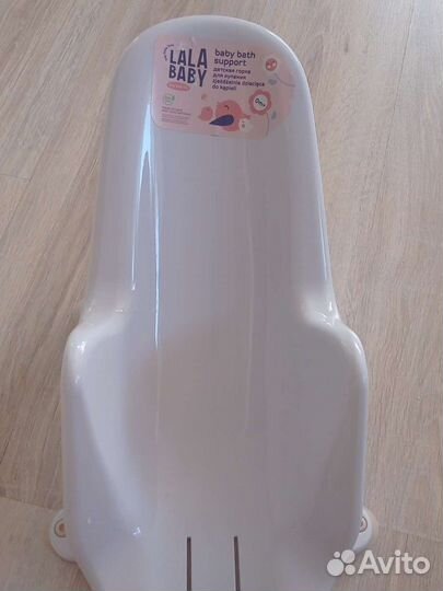 Горка и круг для купания новорожденных