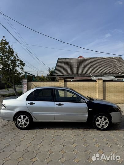 Mitsubishi Lancer 1.6 МТ, 2003, 124 525 км