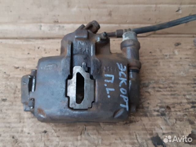 Суппорт передний левый Форд Эскорт 90-95г.в