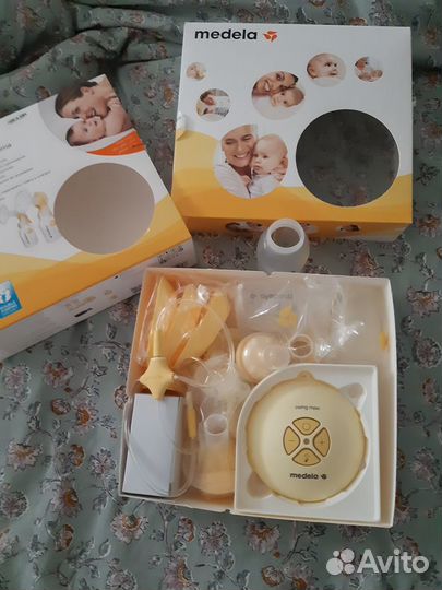 Молокоотсос электрический medela swing maxi