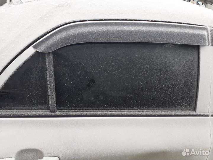 Стекло дверей Toyota Corolla