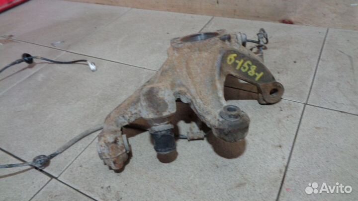 Кулак поворотный З/П Mitsubishi Galant 9