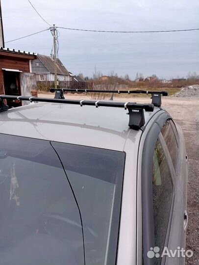 Багажник на крышу thule