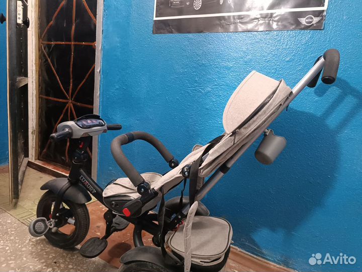 Трёхколёсный велосипед коляска