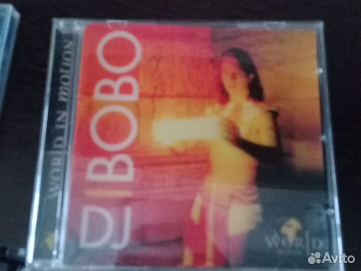 CD: DJ Bobo - World In Motion / Sash - Best Of