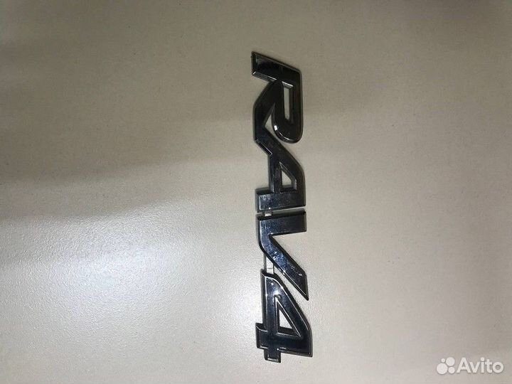 Эмблема надпись на крышку багажника Toyota RAV4