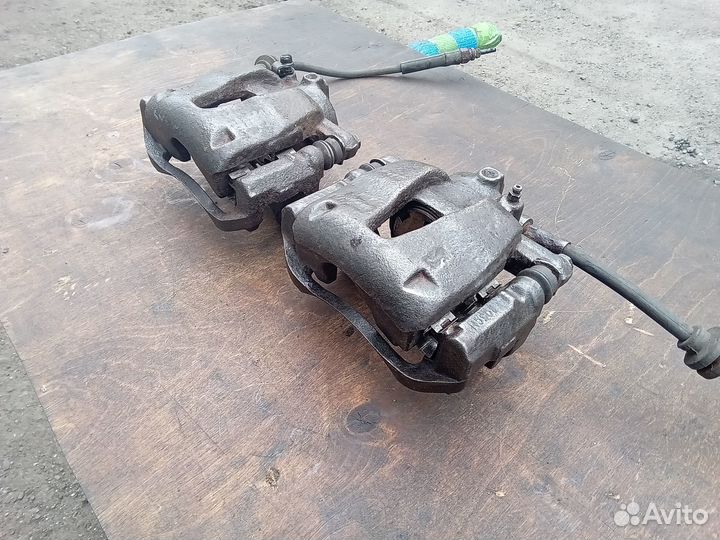 Суппорт тормозной передний Opel Corsa D