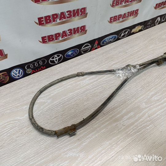 Трос стояночного тормоза левый Honda Domani 1999