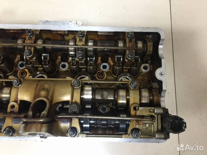 Б/У Головка блока цилиндров 11121556428 BMW