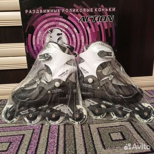 Роликовые коньки