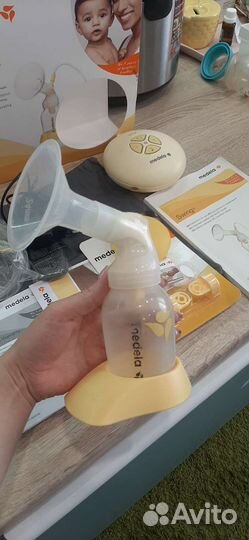 Молокоотсос medela swing