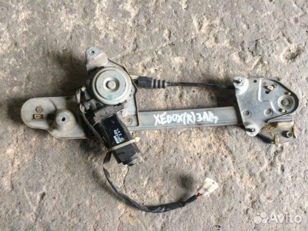 Стеклоподъемник электрический задний правый Mazda