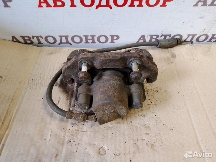 Суппорт тормозной передний правый Mazda 2 1.25