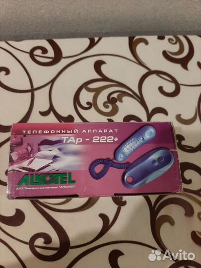 Проводной телефон