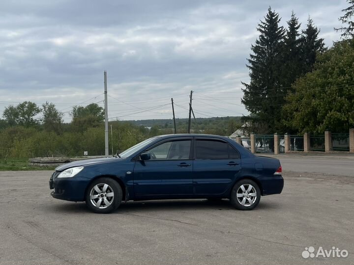 Mitsubishi Lancer 1.6 МТ, 2005, 197 000 км
