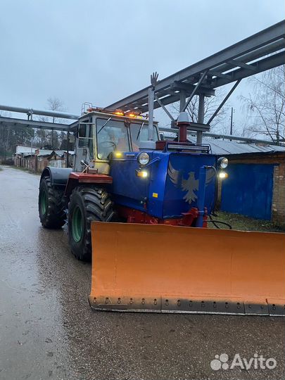 Уборка снега трактором