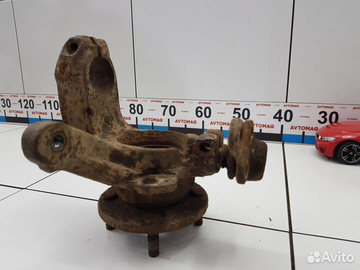 Кулак поворотный передний левый (Ford Courier)