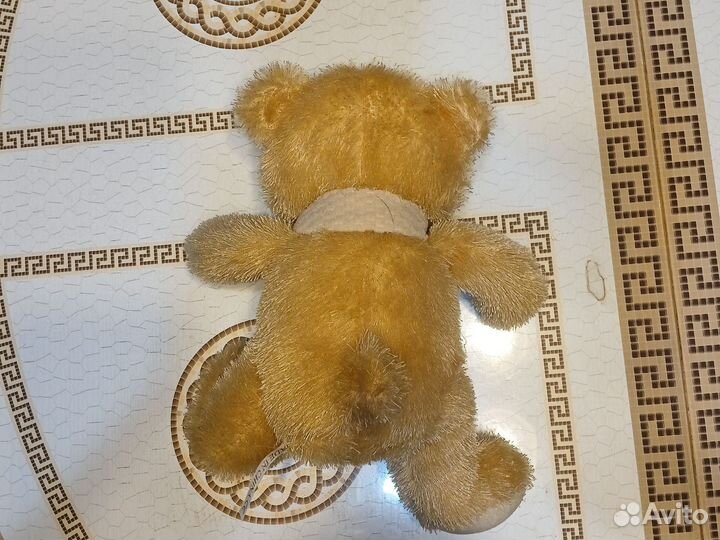 Плюшевый медведь