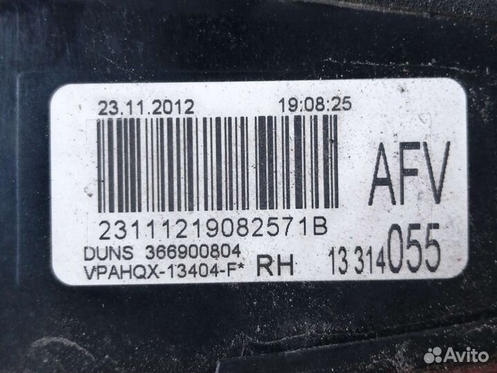 Фонарь багажника левый универсал Opel Astra J, 13